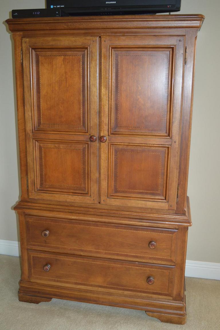 Alexander julian store armoire