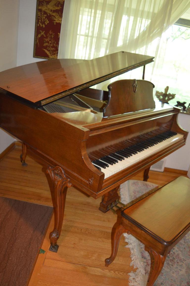 Wurlitzer grand piano deals value