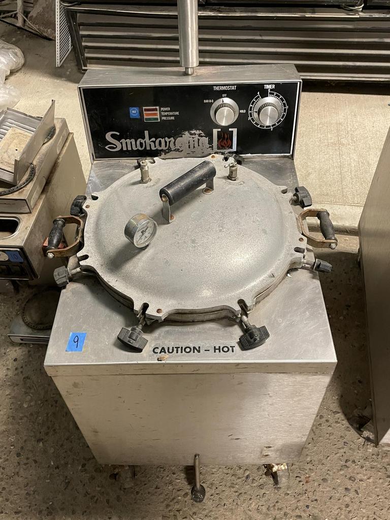 Pressure smoker outlet